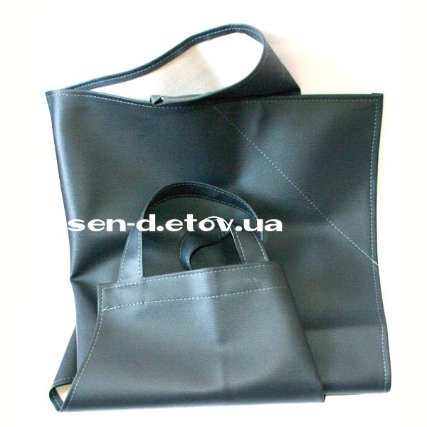 Фартухи і нарукавники водонепроникні